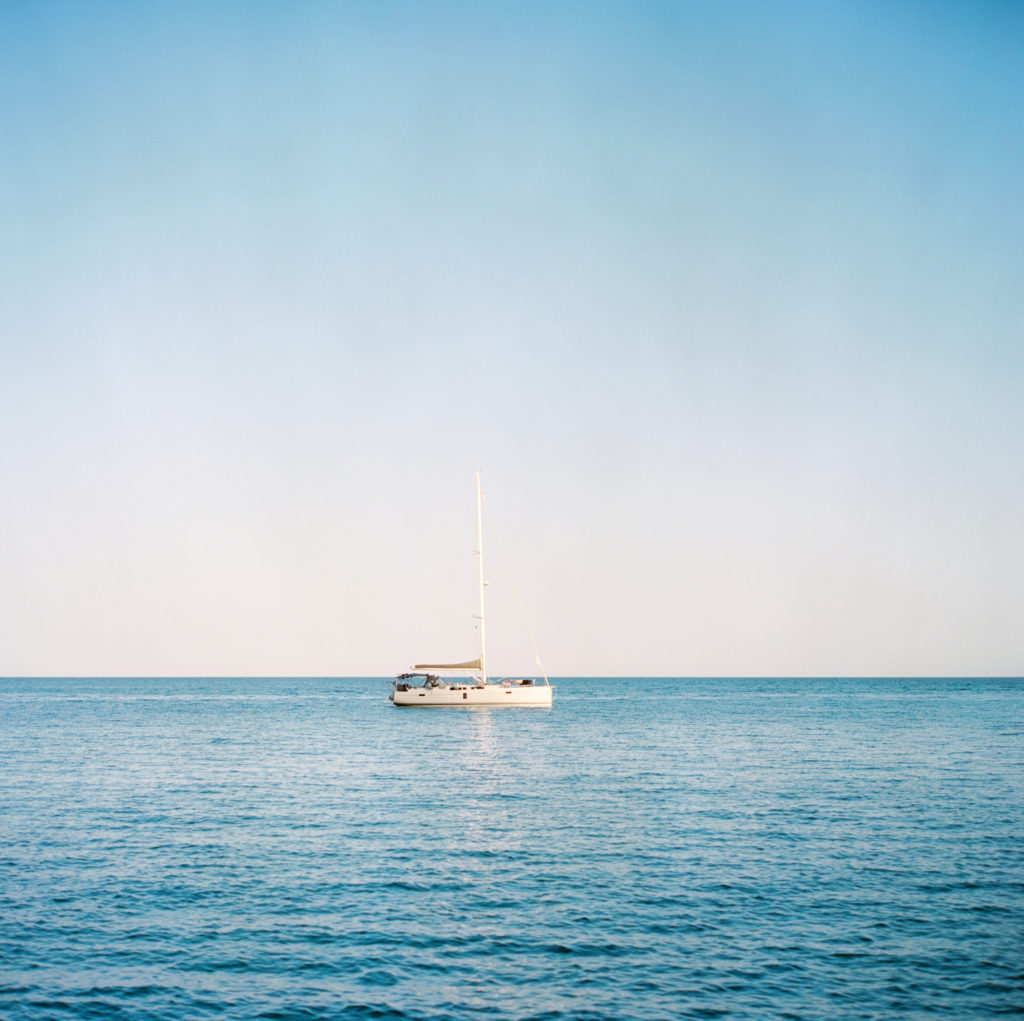 A sailboat is a beautiful idea for an engagement session on the French Riviera